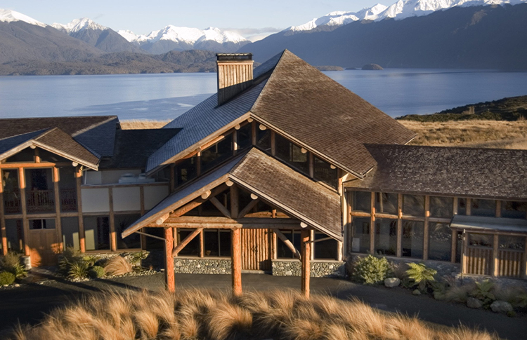 Aerial shot of Fiordland Lodge, Lake Te Anau and Southern Alps.